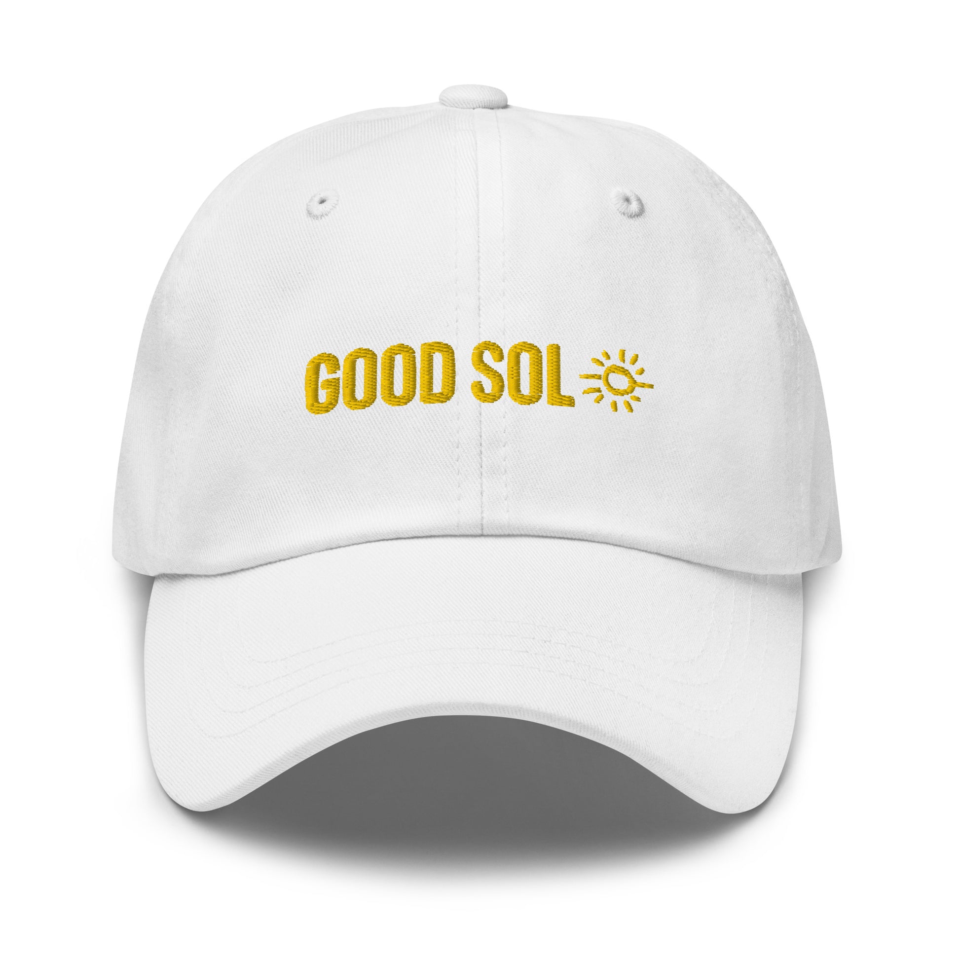 A white dad hat with the word Good Sol and a drawing of a sun is threaded at the top.