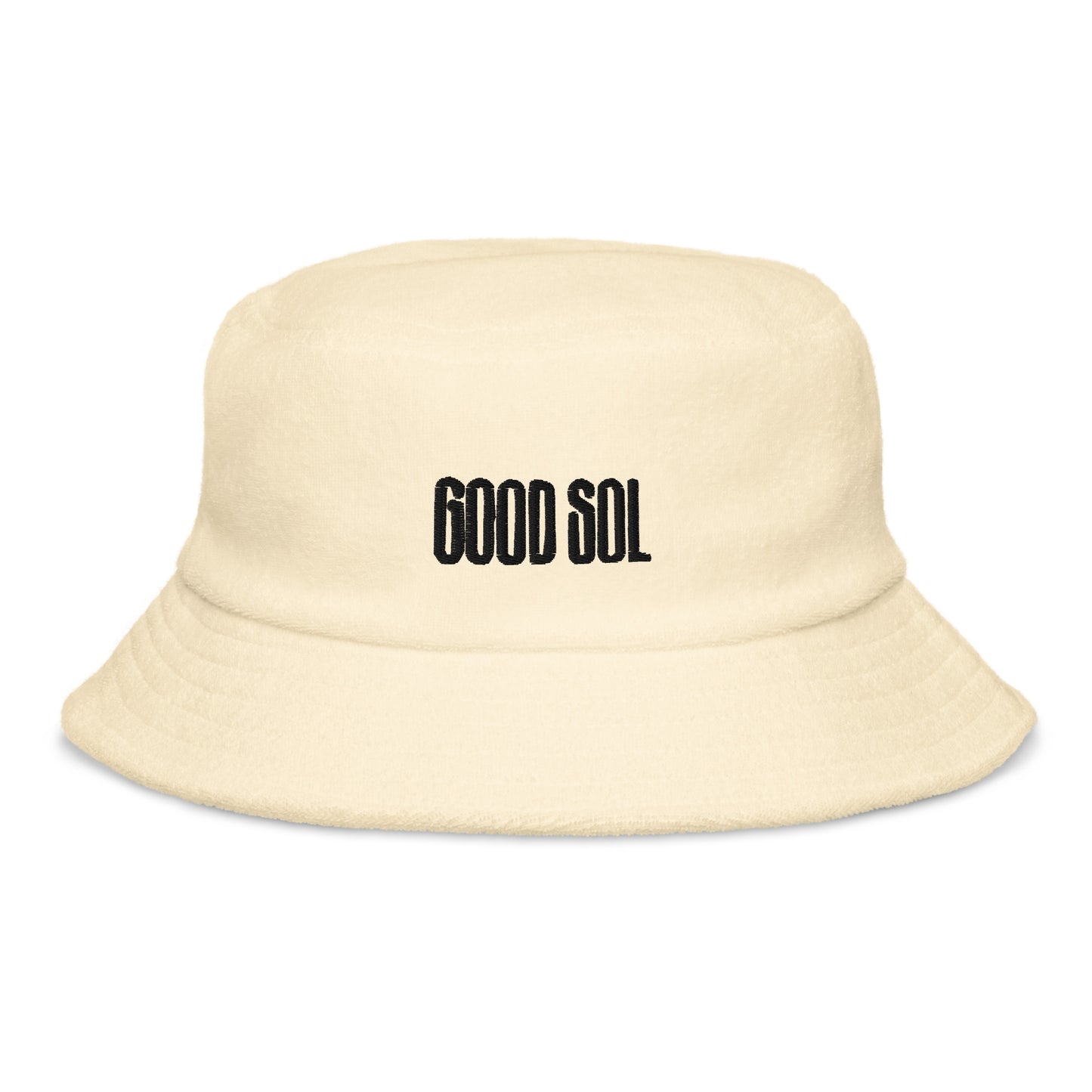 A yellow terry cloth bucket hat with the word Good Sol is threaded at the top.